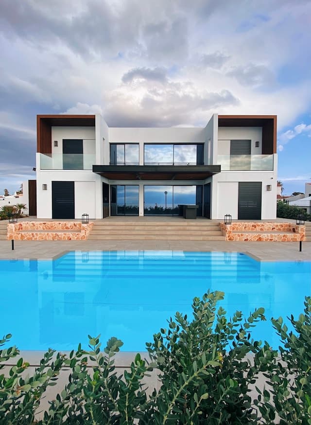 Modern apartment building with city skyline